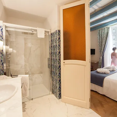 Algila Ortigia Charme Hotel 4*